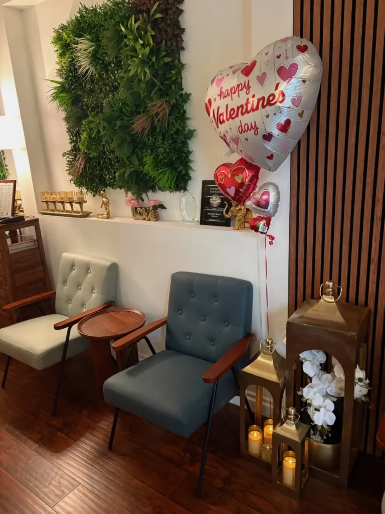 Valentine's balloon and seating area decorated for the holiday